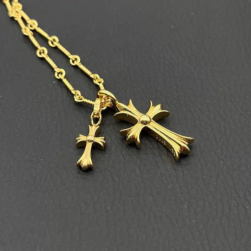 Chrome Hearts Gold Cross Pendant with Gemstones